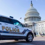Man With Working Guillotine Near the U.S. Capitol! Police SUV parked near the United States Capitol building