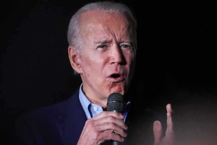 Joe Biden speaking into a microphone