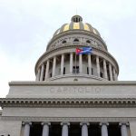BLOODBATH Warning: Cuba Sends Trump Chilling Threat! Capitol building dome with columns and a flag