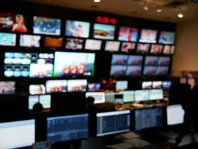 control room with multiple screens and monitors