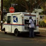 USPS Mailman ARRESTED – Feds Make Disturbing Discovery Mail carrier standing behind a USPS truck on a suburban street