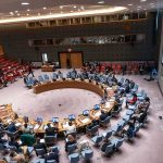 Trump’s Photo Brawl Shakes G7 Delegates seated around a circular conference table in a large chamber