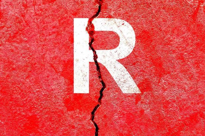 shutterstock_2222197027 Letter R on cracked red wall