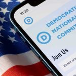Cease-And-Desist Bomb Hits Dem Campaign Ad Smartphone showing a political committee webpage on an American flag