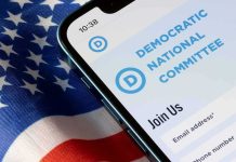Cease-And-Desist Bomb Hits Dem Campaign Ad Smartphone showing a political committee webpage on an American flag