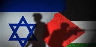 Silhouettes of armed soldiers over Israel and Palestine flags