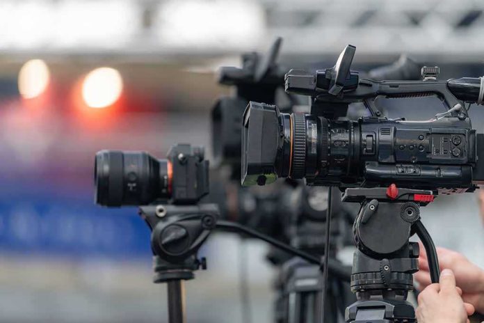 shutterstock_2762343045-5 Professional video cameras on tripods
