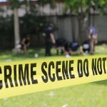 Midnight Chaos: Teens GUNNED DOWN crime scene tape cordoning off a grassy area
