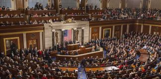 GOP Civil War Erupts – Members Fleeing Party Legislative chamber filled with attendees during a formal address