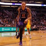 WNBA Clown Show, Player Attacks Fan Mid-Game Brittney Griner driving to the basket during a basketball game
