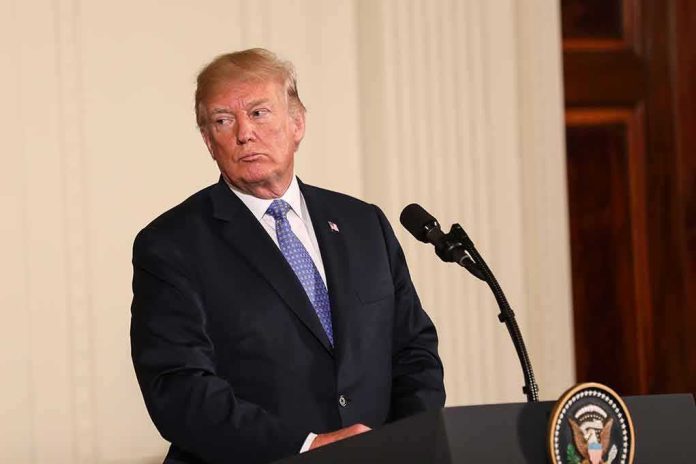 Donald Trump at a podium with microphone