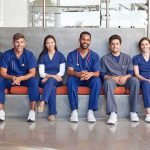 Nurse Charged After Helping Illegal Escape Federal Custody Group of medical professionals sitting on a bench
