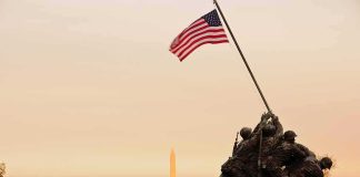 Illegal Who Beheaded Iwo Jima Statue Gets Big Break From Judge Iwo Jima Memorial with soldiers raising the American flag at sunset