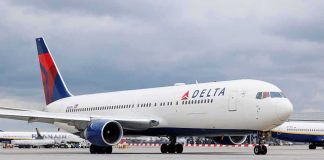 Delta Air Lines passenger jet taxiing on airport tarmac
