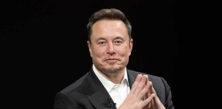 Pentagon Assigns Musk TOP Military Role, Even Gives Him an Office Elon Musk seated in a black suit with hands clasped