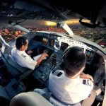 Video Leaked Of Israeli Hijacker Cockpit Brawl Pilots in an airplane cockpit during city approach at sunset