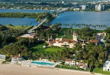 Trump Eyes Creating The Next Camp David For Future Presidents Aerial view of a waterfront estate with pool, lawns, and palm trees
