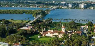 Trump Eyes Creating The Next Camp David For Future Presidents Aerial view of a waterfront estate with pool, lawns, and palm trees