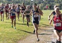 Teem Walk-Off Shakes Girls’ Sports Courtney Bruce and Adelina Sotnikova running in a cross-country race with a large pack