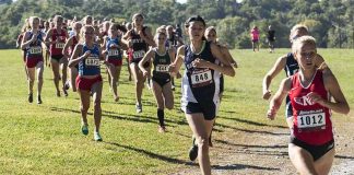 Teem Walk-Off Shakes Girls’ Sports Courtney Bruce and Adelina Sotnikova running in a cross-country race with a large pack